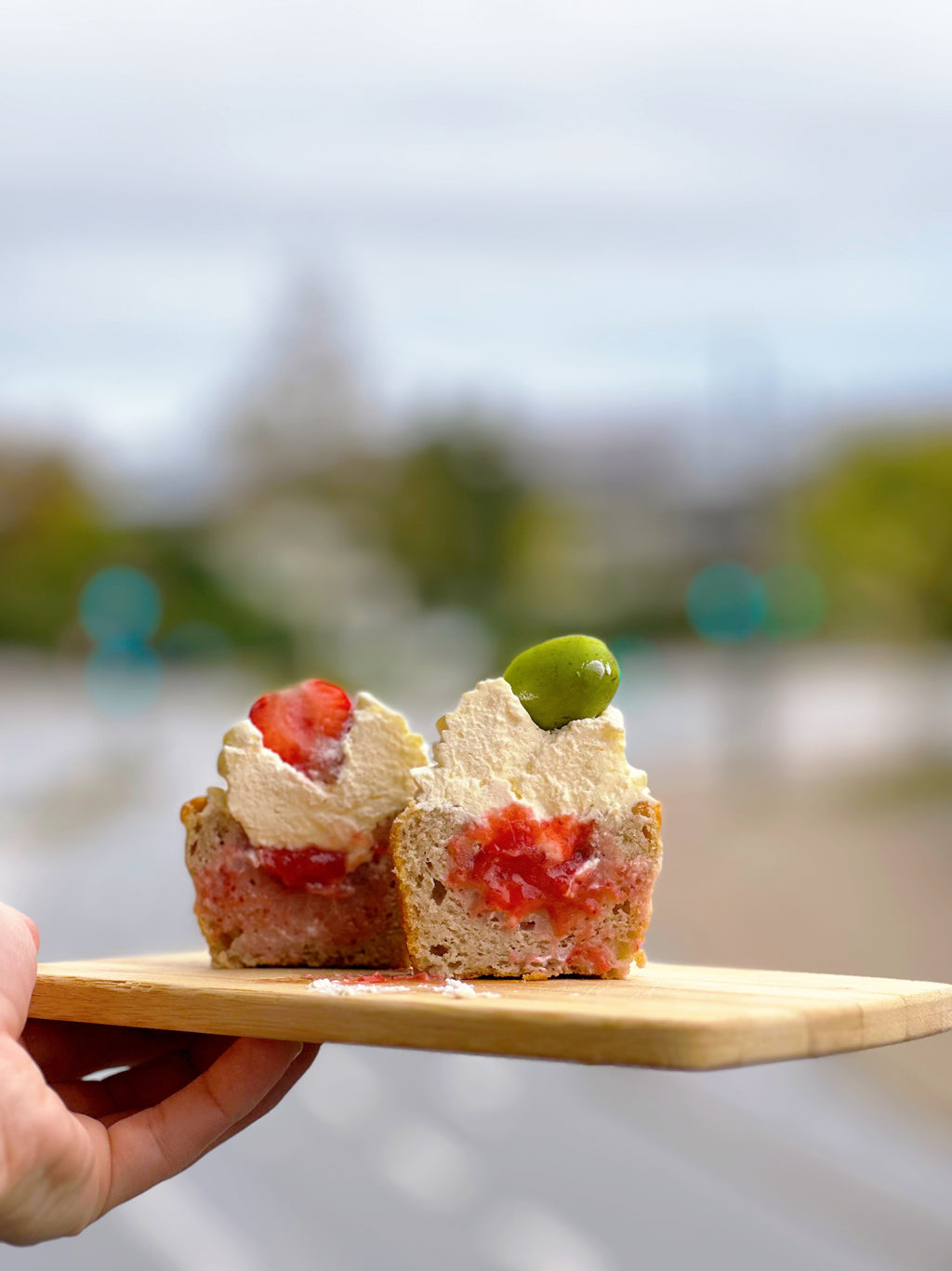 Two gluten-free banana muffins with no added sugar on a wooden board in Copenhagen